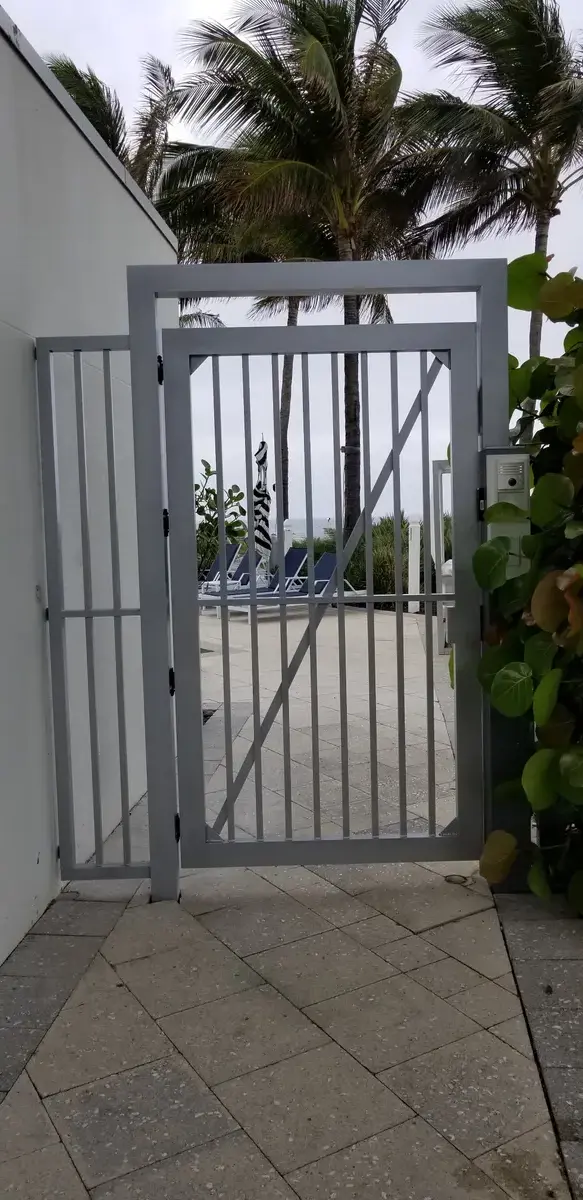 Modern gray custom aluminum gate installation